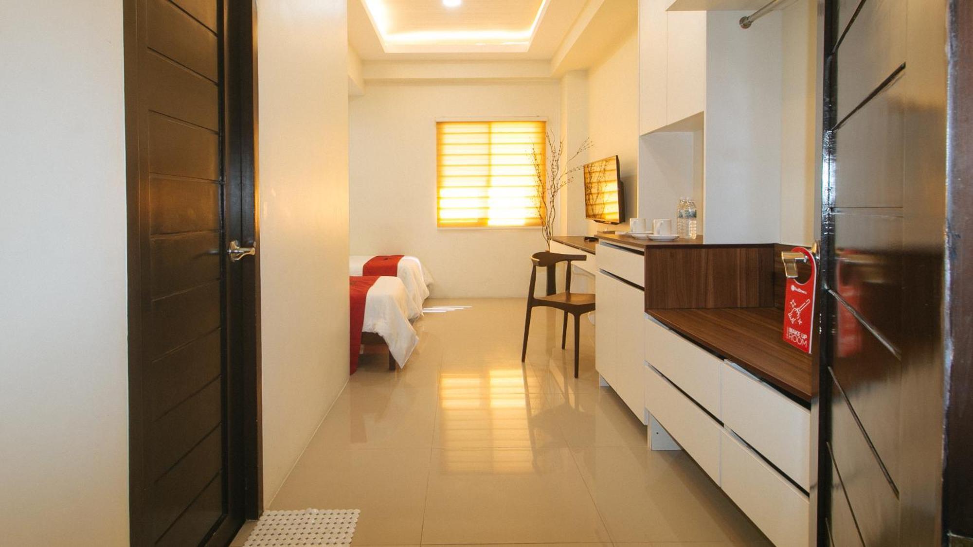 Reddoorz @ Leoncia Apartelle Mandawe Exterior photo